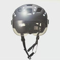 Load and play video in Gallery viewer, Sleek Black Ebike Bicycle Helmet with an Adjustable Visor, Designed for Men and Women Seeking Style and Safety on E-Bike Rides

